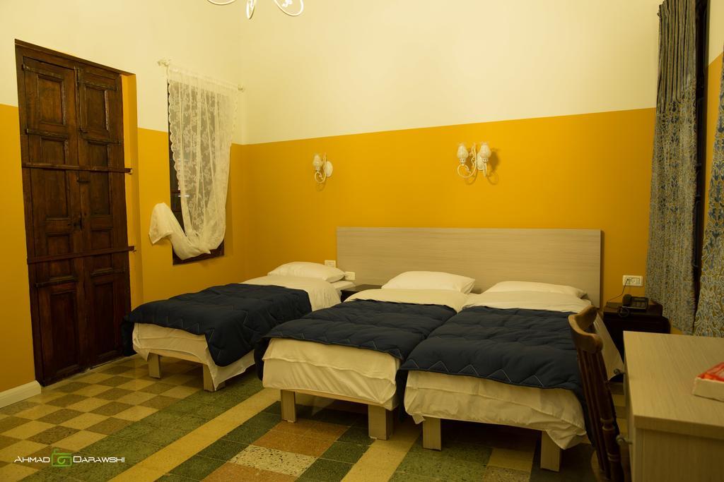 Al-Hakim Boutique Hotel Old Town Nazaré Quarto foto