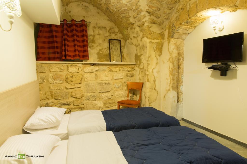 Al-Hakim Boutique Hotel Old Town Nazaré Quarto foto